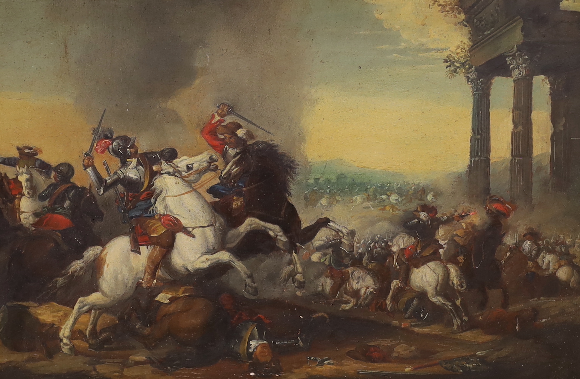 Manner of Pieter Wouverman (1623-1682), oil on board, Battle scene with cavaliers before ruins, 29 x 43cm